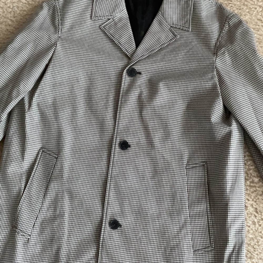 Rain or shine Mid length coat. Worn once Excellent Condition